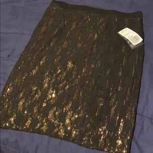 Forever 21 knee length skirt black and gold NWT